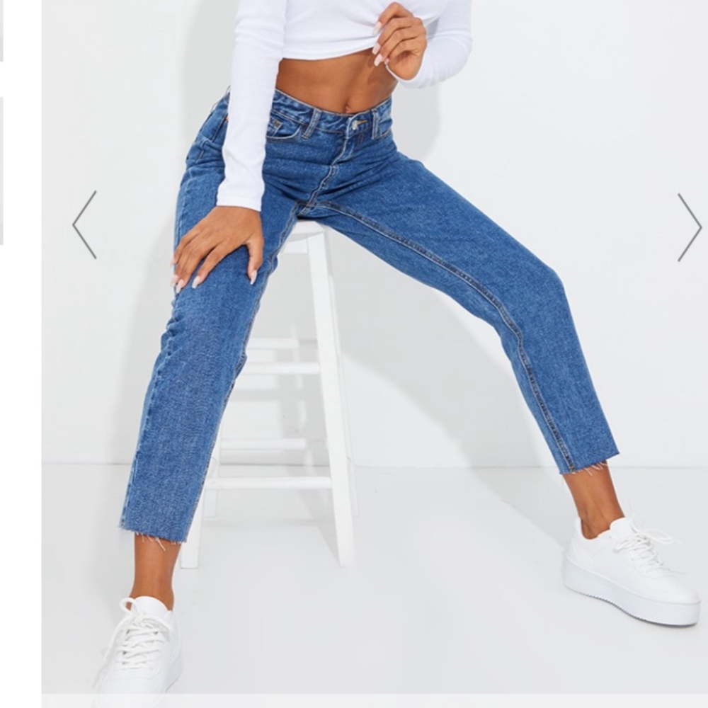 Mid blue wash raw hem cropped slim mom jean